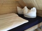 Doppelbett im Dachgiebel